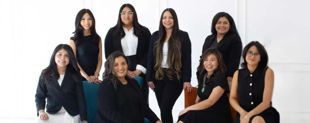 Team of immigration professionals at the Law Office of Carrie Nguyen in Arlington, Texas, providing legal support for families, citizenship, and immigration interviews.