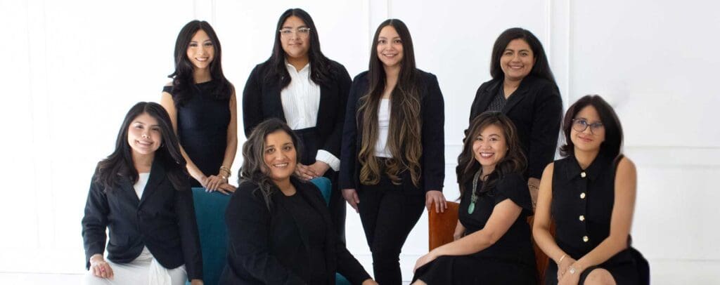 Team of immigration professionals at the Law Office of Carrie Nguyen in Arlington, Texas, providing legal support for families, citizenship, and immigration interviews.